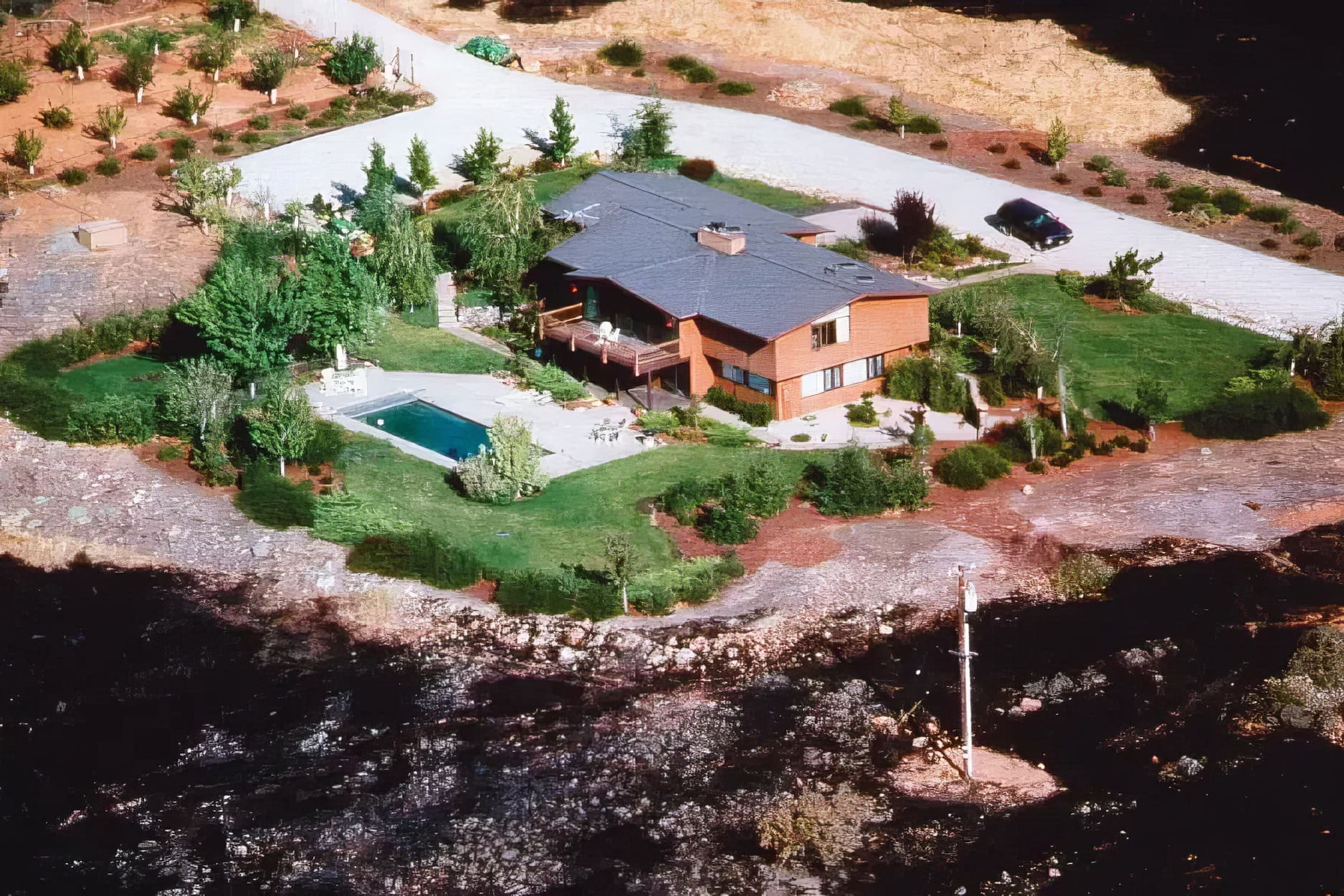 house with scorched earth around it
