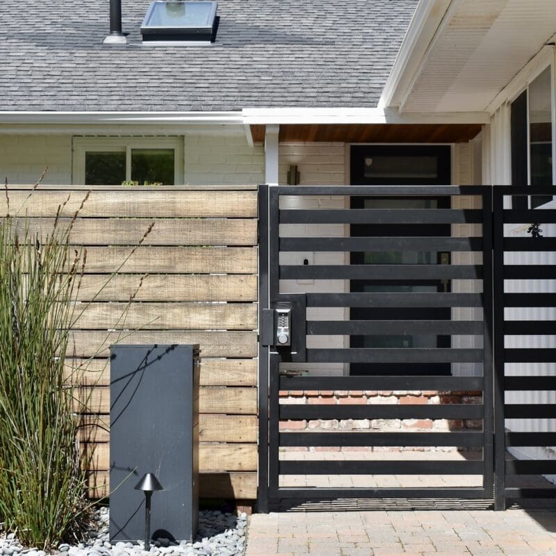 metal gate attached to house