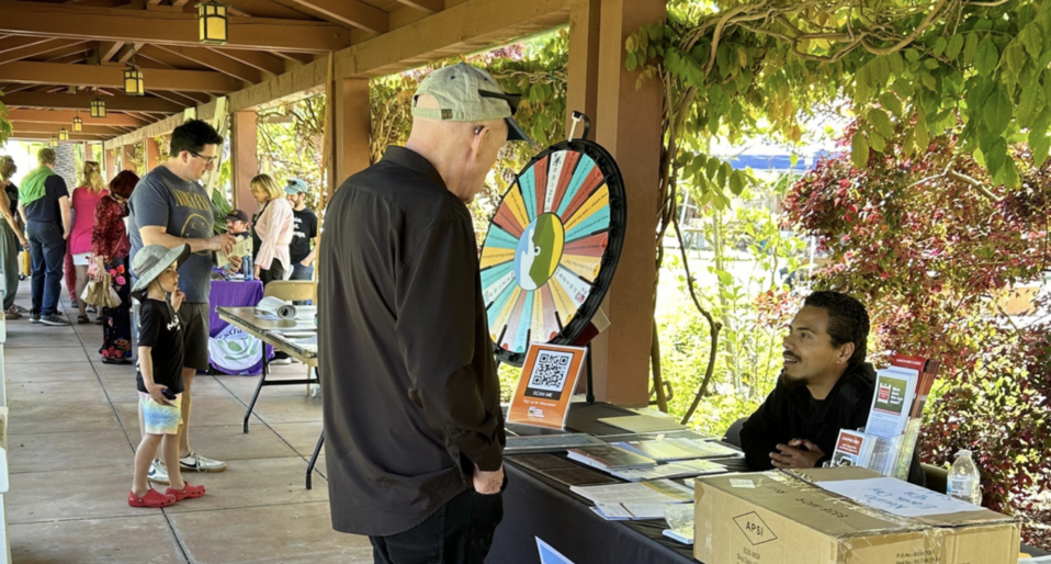 Resident speaking with Community Ambassador