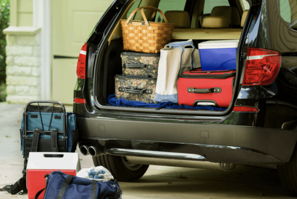 Open trunk of car with luggage