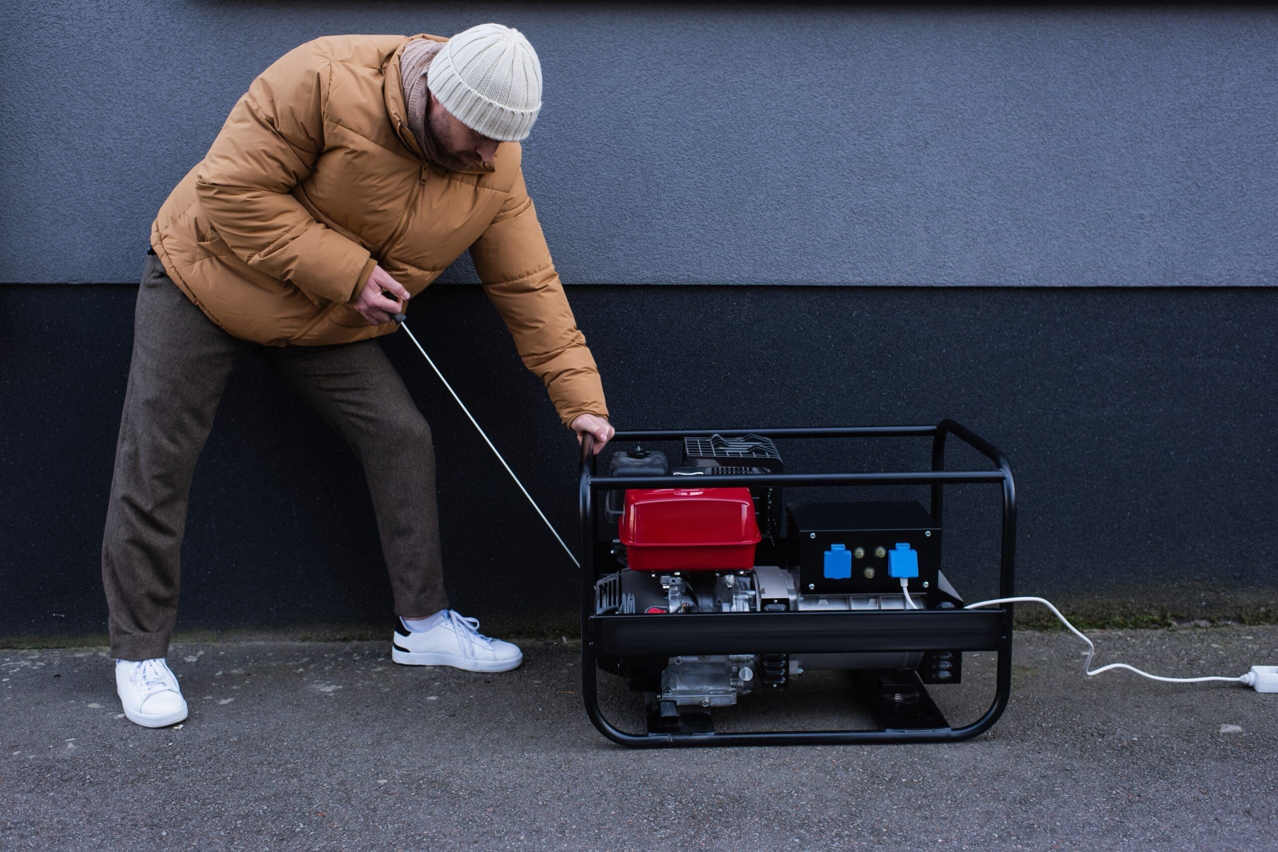 Man,In,Down,Jacket,Starting,Power,Generator,During,Electricity,Shutdown
