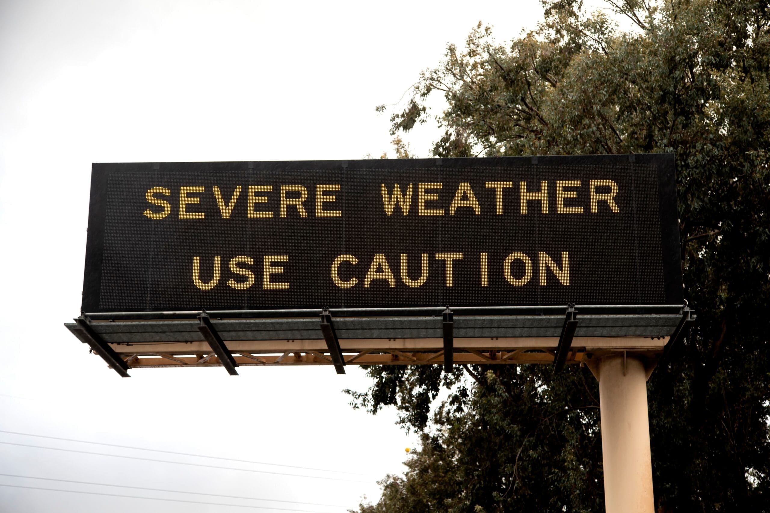 Digital,Sign,At,Freeway,Stating,Severe,Weather,Use,Caution,.
