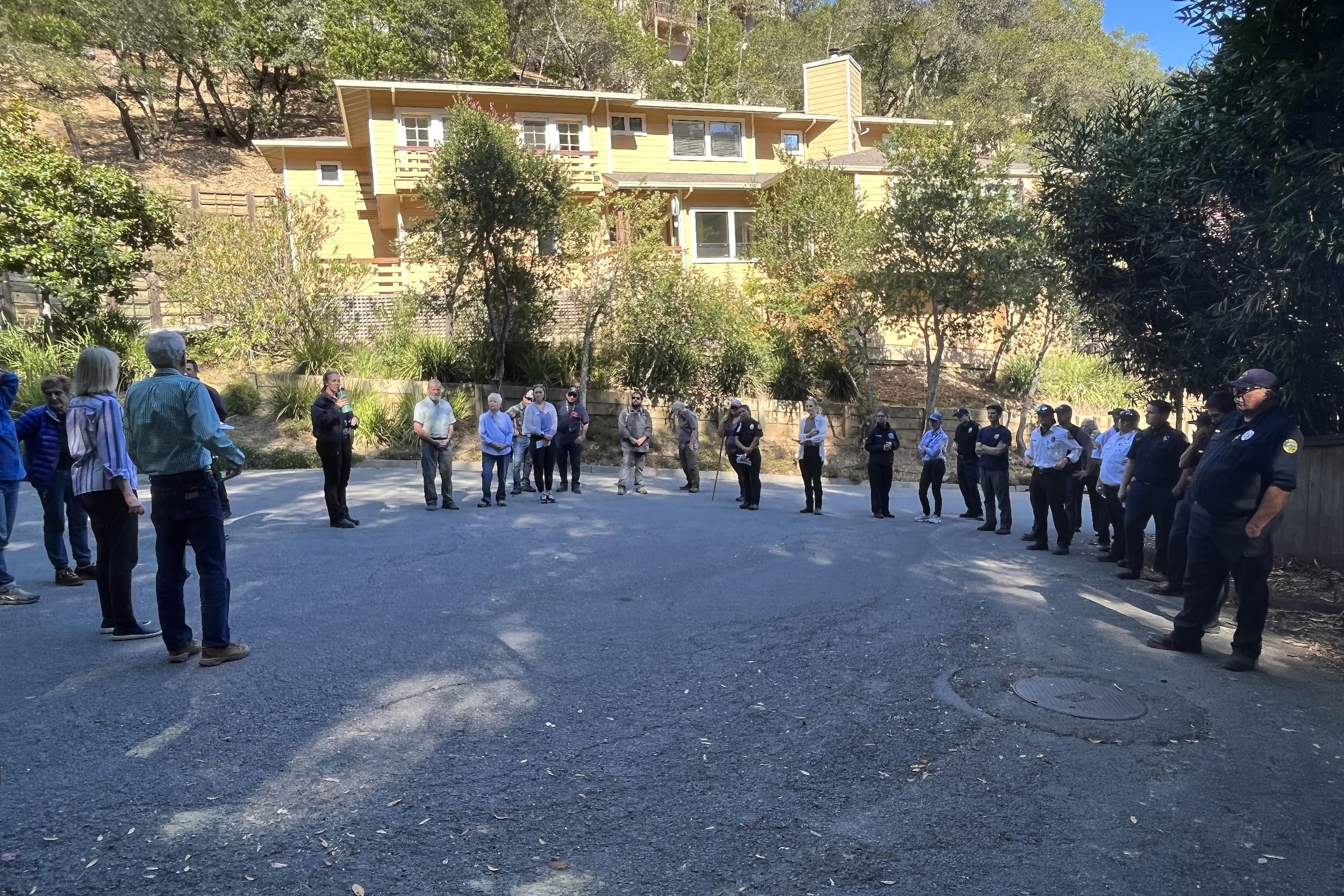 people standing in circle discussing something